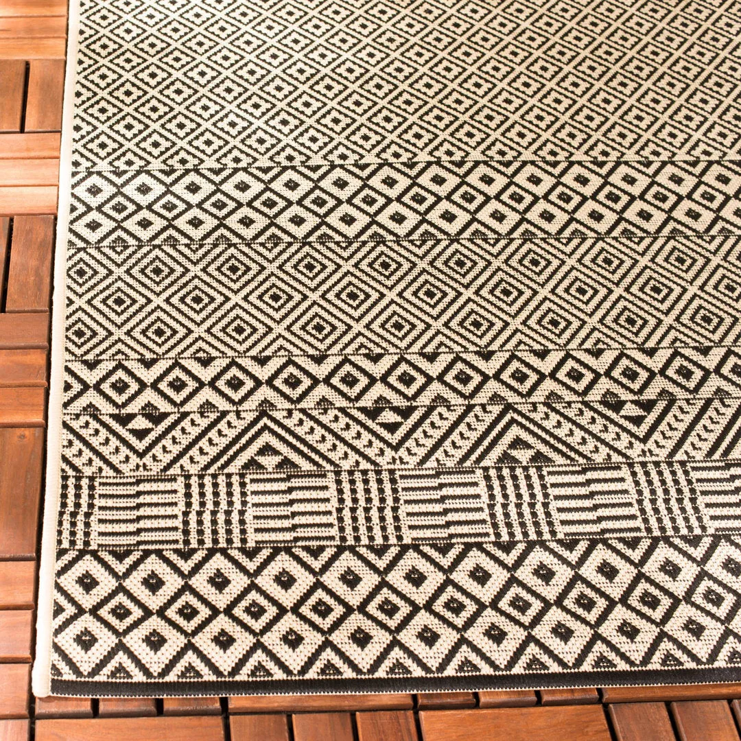 Arneshia Geometric Beige Indoor / Outdoor Area Rug Wade Logan® Rug Size: Rectangle 2' x 3'7"